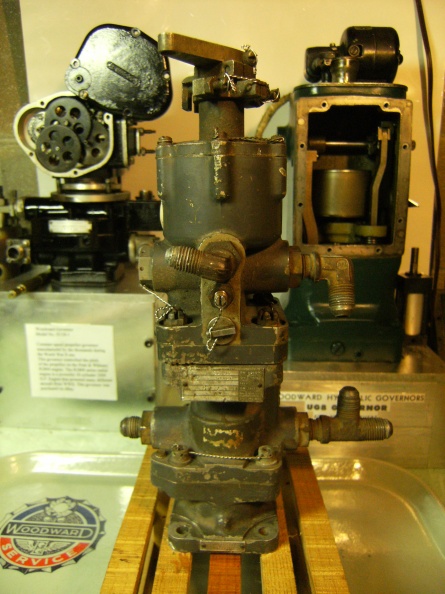 A vintage Woodward propeller governor with a hydraulic oil pump attached.JPG